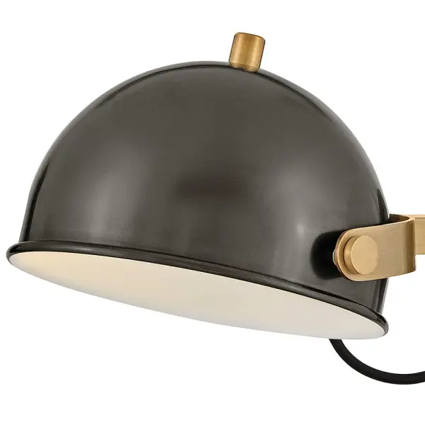 A modern bedside sconce with a vintage feel, Spence’s adjustable, rotating shade, painted white interior, and convenient on/off switch create the ideal reading or task light. Heritage Brass details and removable, black, fabric-wrapped cord complement a Black Oxide or Chalk White finish. - alternate view
