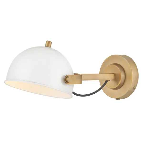 A modern bedside sconce with a vintage feel, Spence’s adjustable, rotating shade, painted white interior, and convenient on/off switch create the ideal reading or task light. Heritage Brass details and removable, black, fabric-wrapped cord complement a Black Oxide or Chalk White finish.