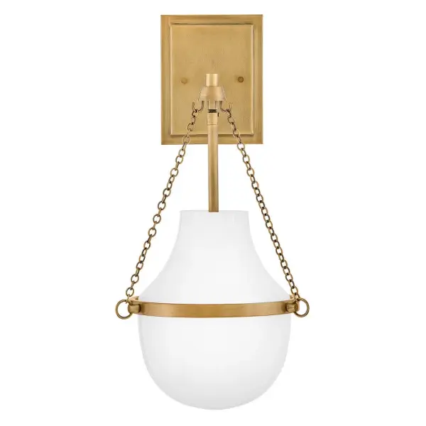 Fusing a sculpted, modern form with classically styled details, Collins features a transitional teardrop shade crafted from blown, Cased Opal glass. A central metal band and delicate chain uprights are available in Black Oxide, Heritage Brass, Heritage Bronze, or Polished Nickel finishes. - alternate view