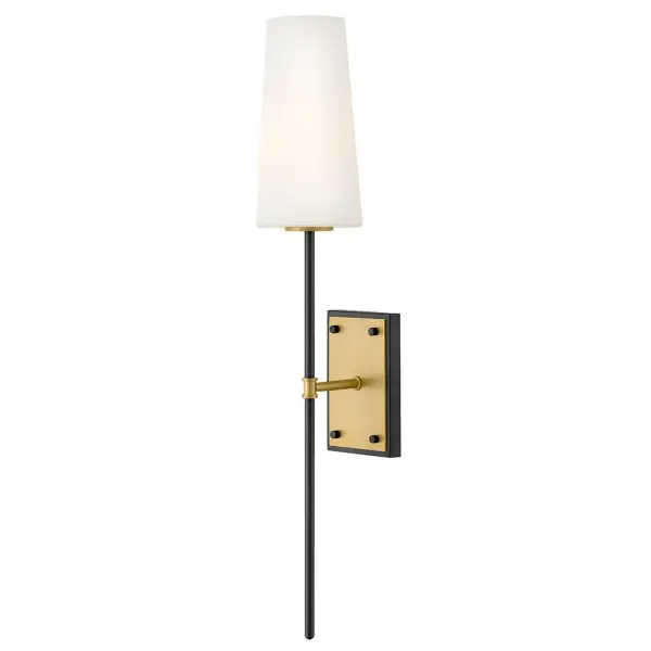 Saunders boasts a striking yet effortless appeal, blending traditional elements with captivating, midcentury modern details. A slim silhouette and decorative stem holders are finished in Lacquered Brass or Black with Lacquered Brass, paired with blown, etched opal glass shades.