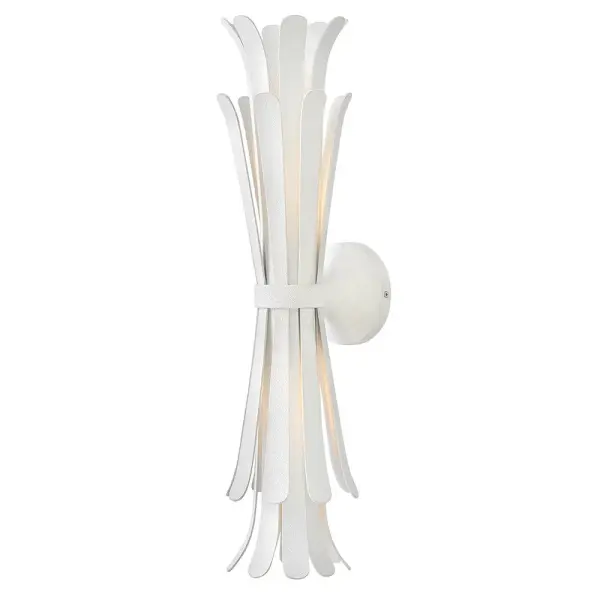 Remarkably dramatic, Reina’s repeating flared fronds surround its central drum and etched white glass diffuser, making a refined yet striking statement within any space. A Distressed Brass finish creates a classic look while the white Textured Plaster finish provides a more modern feel.