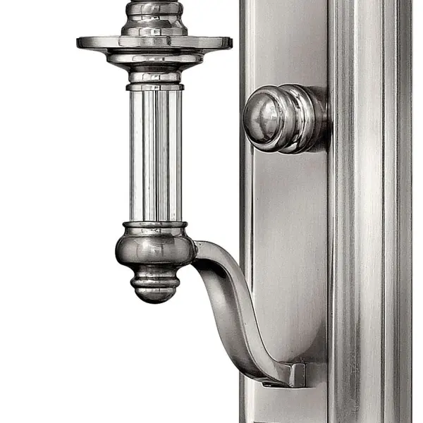 Sussex offers traditional charm with an edge of modern luxury. The fabric hardback shade and clear glass columns and candles add to its sophistication.