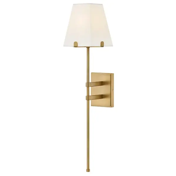 Tall and minimalist Benton’s simply chic silhouette easily complements any space or décor style. White hardback linen shades are supported by a slim stem and prongs in a Black or Lacquered Brass finish.
