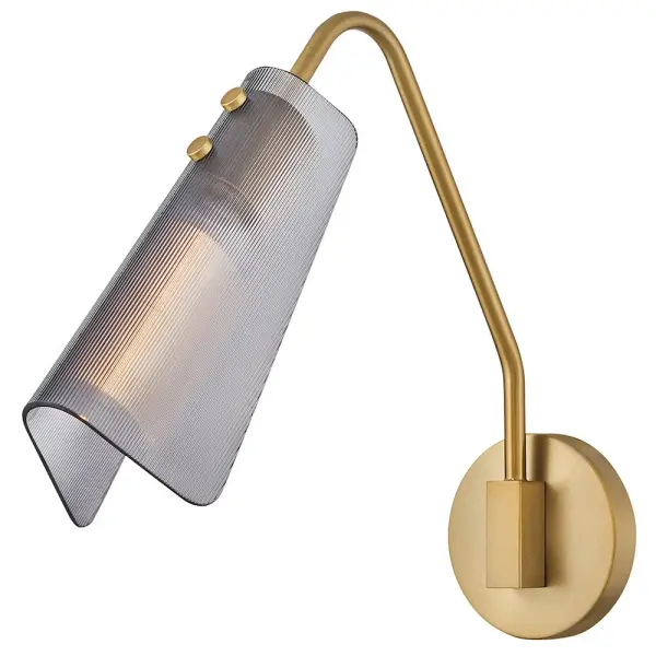 A stunning midcentury treasure, Altman’s industrial style is complemented by a large, folded glass shade at the end of an articulating arm. Ribbed smoked glass or clear glass softly diffuses and directs illumination to accentuate your surrounding space and décor.