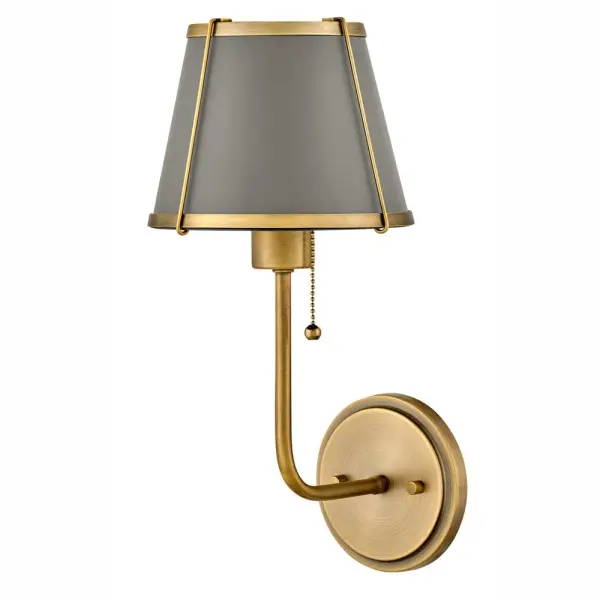 An effortless blend of classic style elements, Clarke’s transitional design is fresh and elegant. Its captivating metal or linen shade and contrasting frame lend architectural beauty to any space with a selection of sophisticated finishes to complement any décor aesthetic.
