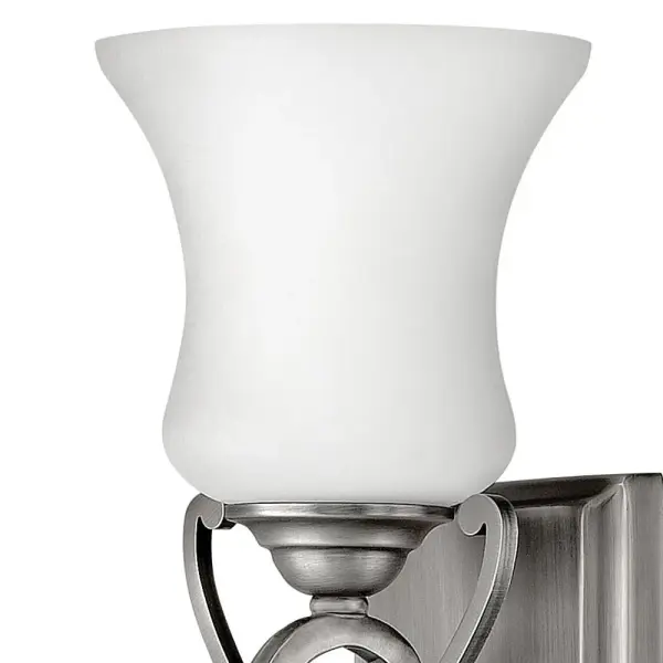 Brooke's updated traditional look features a minimalist forged scroll design in Antique Nickel and Olde Bronze that elegantly complements its etched opal glass. - alternate view