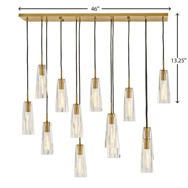The Cosette linear chandelier makes a stunning statement with its elongated 46-inch silhouette and luxurious cut crystal elements. Heritage brass finish adds warmth while clear crystal creates rich, multi-faceted light patterns. Adjustable cords simplify installation and customization. - alternate view
