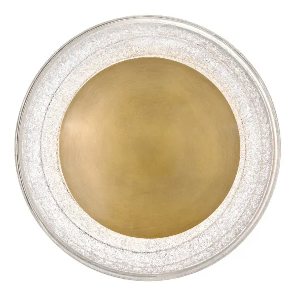 Precisely crafted with a concentric modern shape, Haven’s pressed art glass and Heritage Brass metal cap are expertly molded by lighting artisans to ensure exact proportions. Once formed, the heated glass is dusted with fine glass powder that sparkles in the glow from integrated Warm Dim LEDs.