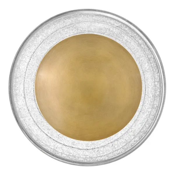 Precisely crafted with a concentric modern shape, Haven’s pressed art glass and Heritage Brass metal cap are expertly molded by lighting artisans to ensure exact proportions. Once formed, the heated glass is dusted with fine glass powder that sparkles in the glow from integrated Warm Dim LEDs. - alternate view