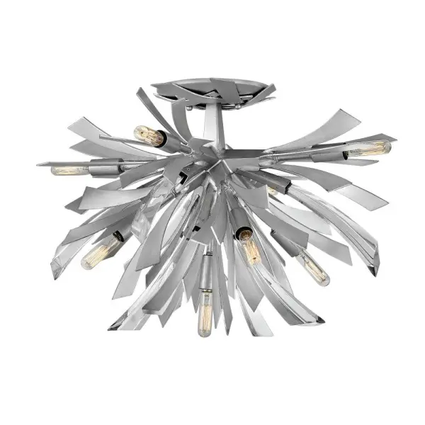 The Vida semi-flush mount delivers high-impact style with its sculptural crystal accents and unique canopy detailing. At 24 inches wide, this statement fixture brings contemporary drama to medium-sized spaces.