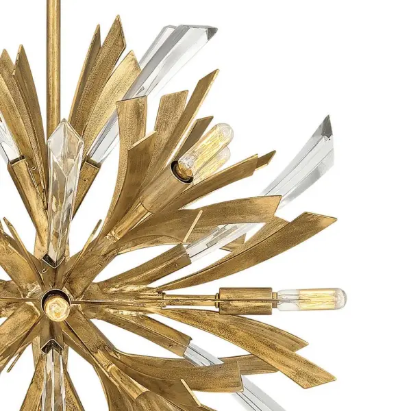 The Vida Small Orb Chandelier makes a bold statement with its flourishing modern design, crystal embellishments, and unique canopy detailing. This highly sculptural piece injects contemporary drama into any space. - alternate view
