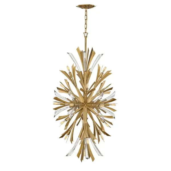 The Vida Medium Orb Chandelier delivers bold contemporary style with its sculptural orb design, crystal accents, and burnished gold finish. At 24 inches wide, it's perfectly sized for medium dining rooms and entryways.
