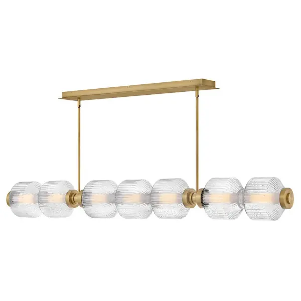 The Reign collection delivers sophisticated glamour with its seven-light linear design featuring clear ribbed glass shades and luxurious lacquered brass finish. Integrated LED lighting provides energy-efficient illumination while the textural glass creates captivating visual interest from every angle.