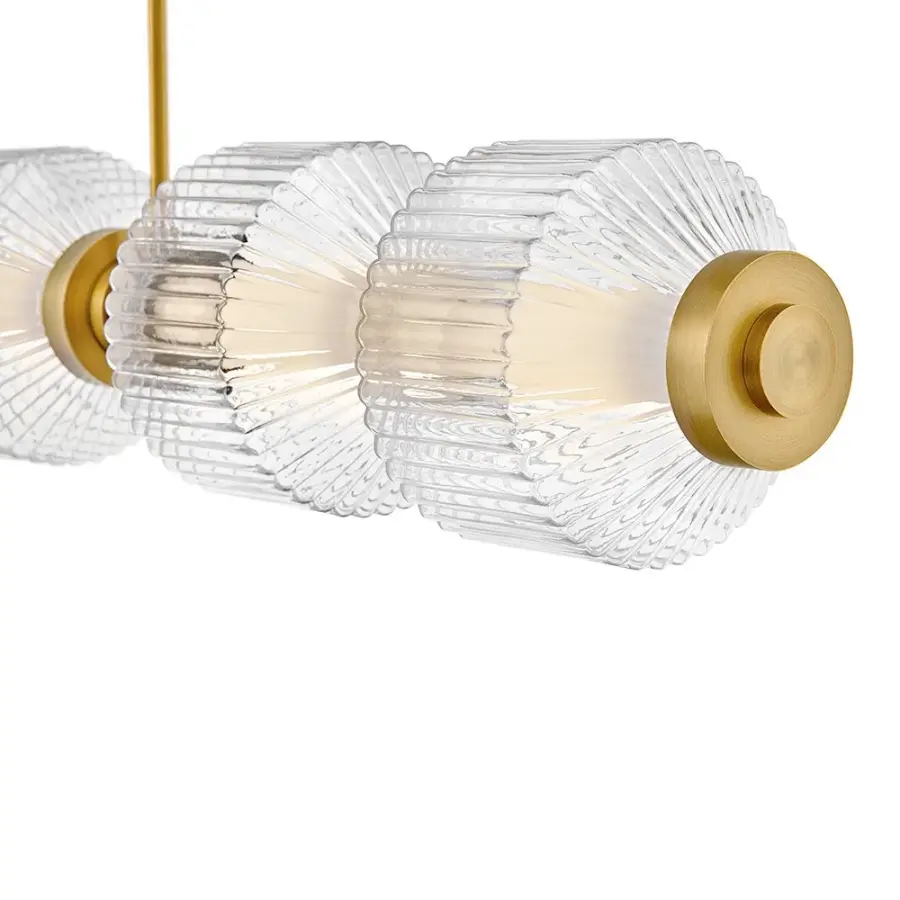 Glamorous Linear Chandelier with Textural Ribbed Glass and Brass Finish - Image 5
