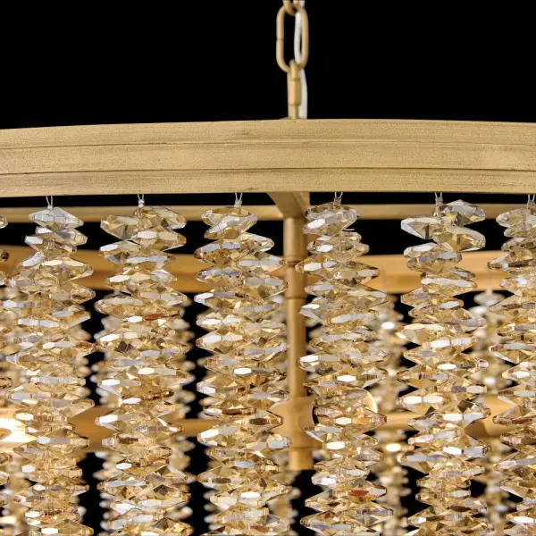 The Rubina chandelier delivers show-stopping glamour with individually strung crystal strands that create mesmerizing light refractions. Its traditional tiered design and Burnished Gold finish offer versatile elegance for formal spaces. - alternate view