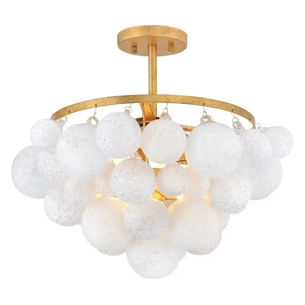 The Marabel semi-flush mount combines artisanal hand-blown crackled glass spheres with a distressed brass frame for sophisticated illumination. Its cluster design creates enchanting light diffusion while maintaining a low profile ideal for standard ceiling heights.