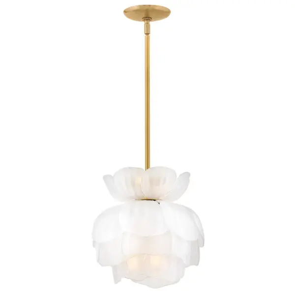 The Fantine pendant transforms preserved flower inspiration into sculptural lighting art. Hand-sculpted glass blooms create mesmerizing light patterns while the unlacquered brass finish develops a unique patina over time, making each piece truly one-of-a-kind.