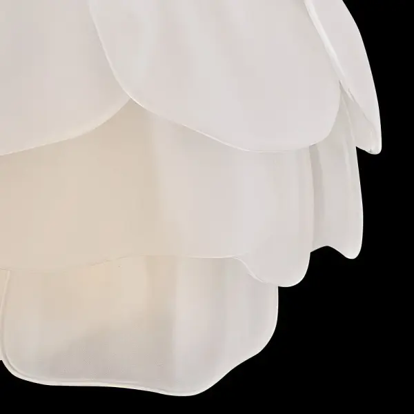 The Fantine pendant transforms preserved flower inspiration into sculptural lighting art. Hand-sculpted glass blooms create mesmerizing light patterns while the unlacquered brass finish develops a unique patina over time, making each piece truly one-of-a-kind. - alternate view