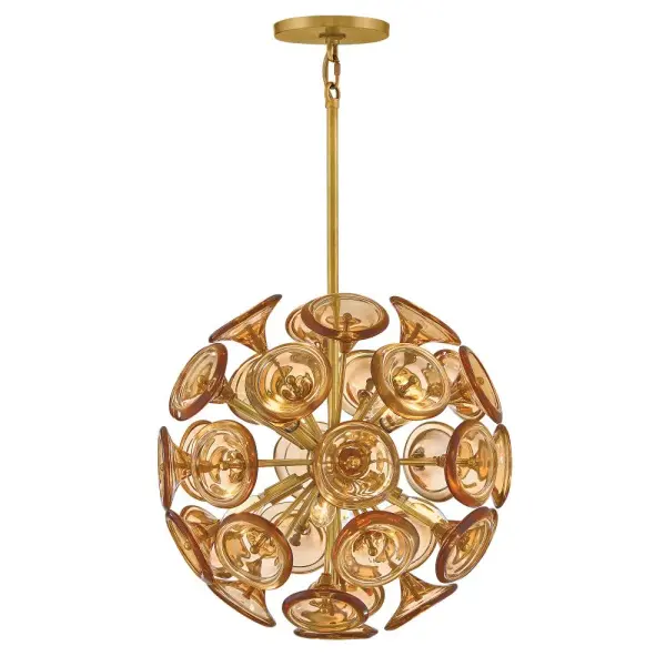 The Maya Large Pendant transforms any space with its artfully arranged hand-blown trumpet glass blossoms and solid brass frame. The unlacquered brass finish develops a beautiful living patina over time, adding character and warmth to contemporary interiors.