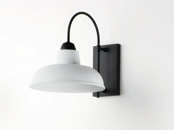 A powder coat aluminum frame support a durable polycarbonate shade in classic RLM styles. This an excellent choice for extreme environments like coastal areas. The combination Black frame and White shade create a dramatic look. Collection: Industrial Finish: White / Black Width: 13.75" Height: 15.75" Length: 18.75" Weight: 2.87 lb Extension from Wall: 18.75" Wire: 8" Canopy: 9.75"x6" Number of Bulbs: 1 Maximum Wattage: 60.00 W Bulb Type: A19 Bulb Base: E26 Medium Light Source: Incandescent Dimmable Voltage: 120.00 V Material: Polycarbonate, Aluminum Safety Listing: cETLus Safety Rating: Wet Manufacturer Warranty: 1 Spec Sheet Instructions Parts Diagram - alternate view