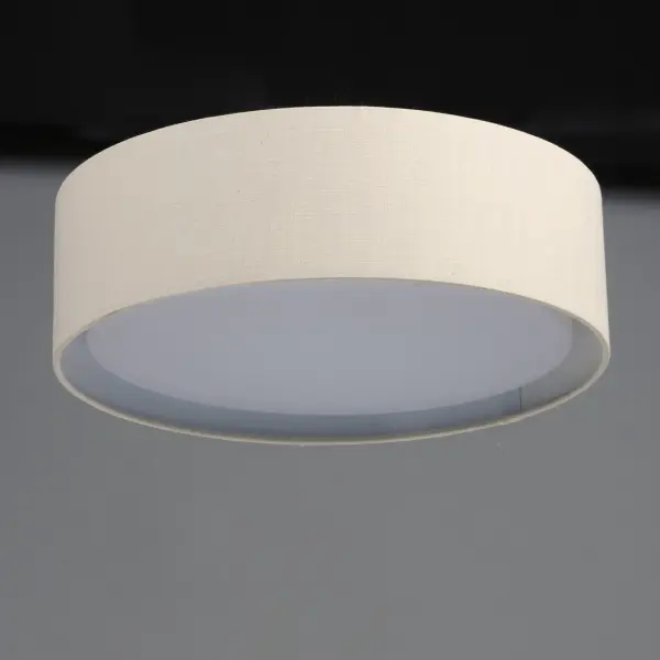 Drum shades in a variety of fabrics and materials are a core lighting offering. Flush mounts, pendants, and ADA sconces are available in options of linen, organza, grasscloth, and sound absorbing grey felt shades. An internal acrylic diffuser, illuminated by an evenly dispersed powerful LED light source, directs light downward and produces an ambient glow inside the outer shade. This lens features a crisp and tidy twist-lock mechanism that eliminates any visible hardware. whether it is put in a residential or commercial context, this collection meets the necessary application needs while adding style to the space. Collection: Prime Width: 20.00" Height: 5.50" Length: 20.00" Weight: 6.31 lb Wire: 6" Canopy: 17.75"x17.75"x1.35" Bulbs Included Number of Bulbs: 5 Maximum Wattage: 6.50 W Bulb Type: LED Bulb Base: PCB Integrated Light Source: LED Light Output: 2000.00 lm Color Temperature: 3000 K CRI: 90 Rated Average Life: 35000 Voltage: 120.00 V Material: Steel, Acrylic, Fabric Safety Listing: cETLus Safety Rating: Dry LED Manufacturer Warranty: 5 Spec Sheet Instructions Parts Diagram - alternate view