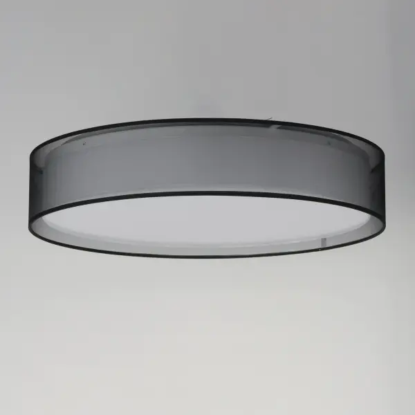 Drum shades in a variety of fabrics and materials are a core lighting offering. Flush mounts, pendants, and ADA sconces are available in options of linen, organza, grasscloth, and sound absorbing grey felt shades. An internal acrylic diffuser, illuminated by an evenly dispersed powerful LED light source, directs light downward and produces an ambient glow inside the outer shade. This lens features a crisp and tidy twist-lock mechanism that eliminates any visible hardware. whether it is put in a residential or commercial context, this collection meets the necessary application needs while adding style to the space. - alternate view