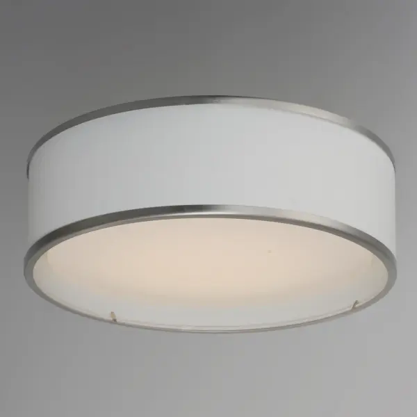 Drum shades in a variety of fabrics and materials are a core lighting offering. Flush mounts, pendants, and ADA sconces are available in options of linen, organza, grasscloth, and sound absorbing grey felt shades. An internal acrylic diffuser, illuminated by an evenly dispersed powerful LED light source, directs light downward and produces an ambient glow inside the outer shade. This lens features a crisp and tidy twist-lock mechanism that eliminates any visible hardware. whether it is put in a residential or commercial context, this collection meets the necessary application needs while adding style to the space. - alternate view
