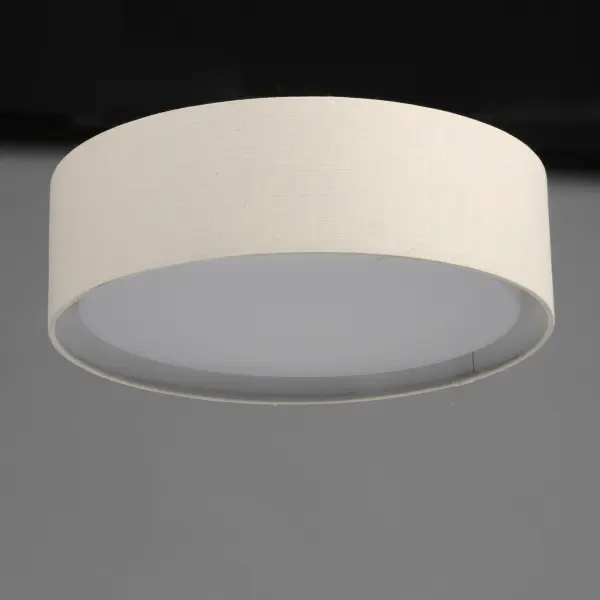 Drum shades in a variety of fabrics and materials are a core lighting offering. Flush mounts, pendants, and ADA sconces are available in options of linen, organza, grasscloth, and sound absorbing grey felt shades. An internal acrylic diffuser, illuminated by an evenly dispersed powerful LED light source, directs light downward and produces an ambient glow inside the outer shade. This lens features a crisp and tidy twist-lock mechanism that eliminates any visible hardware. whether it is put in a residential or commercial context, this collection meets the necessary application needs while adding style to the space. Collection: Prime Width: 20.00" Height: 5.50" Length: 20.00" Weight: 6.66 lb Wire: 6" Canopy: 17.75"x17.75"x0.75" Bulbs Included Number of Bulbs: 1 Maximum Wattage: 28.00 W Bulb Type: LED Bulb Base: PCB Integrated Light Source: LED Light Output: 1700.00 lm Color Temperature: 3000 K CRI: 90 Rated Average Life: 40000 Voltage: 120.00 V Material: Steel, Acrylic, Fabric Safety Listing: cETLus Safety Rating: Dry LED Manufacturer Warranty: 5 Spec Sheet Instructions Parts Diagram - alternate view
