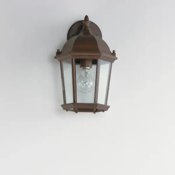 Maxim Lighting's commitment to both the residential lighting and the home building industries will assure you a product line focused on your basic lighting needs. With the Builder Cast collection you will find quality lighting that is well designed, well priced and readily available. Collection: Builder Cast Finish: Empire Bronze Glass: Clear Width: 8.00" Height: 12.00" Weight: 2.56 lb Extension from Wall: 7.00" Canopy: 4.5"x4.5" Number of Bulbs: 1 Maximum Wattage: 60.00 W Bulb Type: A19 Bulb Base: E26 Medium Light Source: Incandescent Light Output: 1150.00 lm Dimmable Rated Average Life: 2500 Voltage: 120.00 V Material: Die Cast Aluminum Safety Listing: cETLus Safety Rating: Wet Manufacturer Warranty: 1 Spec Sheet Instructions Parts Diagram - alternate view