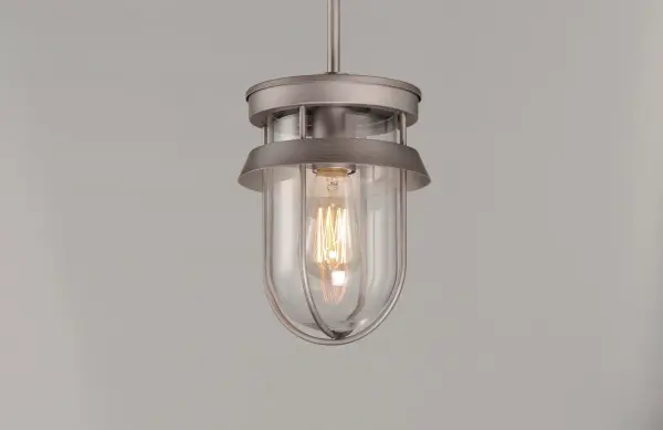 A squared off interpretation of coastal outdoor lighting, Breakwater features a flat top shade and an angular ring to shade and direct the light. Constructed of all aluminum materials which are then powder coated with an exterior paint in your choice of Black or Weathered Zinc. The Clear glass diffusers cleverly twist lock into the frame for a clean and secure installation. - alternate view