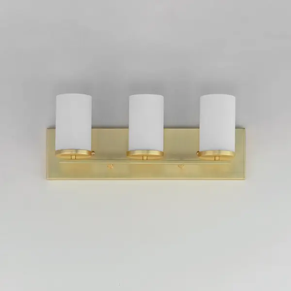 A clean design for the most common applications, the Lateral collection offers chandeliers in both traditional configurations and within a rectangular frame for above dining spaces. Finished in complementary colors including Satin Brass, Satin Nickel or Matte Black, this collection is economically priced with excellent construction. Great for remodeling, this collection's bath vanities feature an extended backplate for cleaner installations. Satin White cylindrical glass sits on a clean rectangular bar. This collection is sure to provide the transitional look to update your next project. Collection: Lateral Finish: Satin Brass Glass: Satin White Width: 20.00" Height: 7.75" Weight: 2.00 lb Extension from Wall: 5.25" Wire: 8" Canopy: 5"x20" Number of Bulbs: 3 Maximum Wattage: 60.00 W Bulb Type: E26 Bulb Base: E26 Medium Light Source: Incandescent Dimmable Voltage: 120.00 V Material: Steel + Glass Safety Listing: cETLus Safety Rating: Damp Spec Sheet Instructions - alternate view