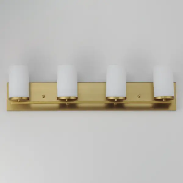A clean design for the most common applications, the Lateral collection offers chandeliers in both traditional configurations and within a rectangular frame for above dining spaces. Finished in complementary colors including Satin Brass, Satin Nickel or Matte Black, this collection is economically priced with excellent construction. Great for remodeling, this collection's bath vanities feature an extended backplate for cleaner installations. Satin White cylindrical glass sits on a clean rectangular bar. This collection is sure to provide the transitional look to update your next project. Collection: Lateral Finish: Satin Brass Glass: Satin White Width: 30.00" Height: 7.75" Weight: 2.80 lb Extension from Wall: 5.25" Wire: 8" Canopy: 5"x30"x0.8" Number of Bulbs: 4 Maximum Wattage: 60.00 W Bulb Type: E26 Bulb Base: E26 Medium Light Source: Incandescent Dimmable Voltage: 120.00 V Material: Steel + Glass Safety Listing: cETLus Safety Rating: Damp Manufacturer Warranty: 3 Spec Sheet Instructions - alternate view