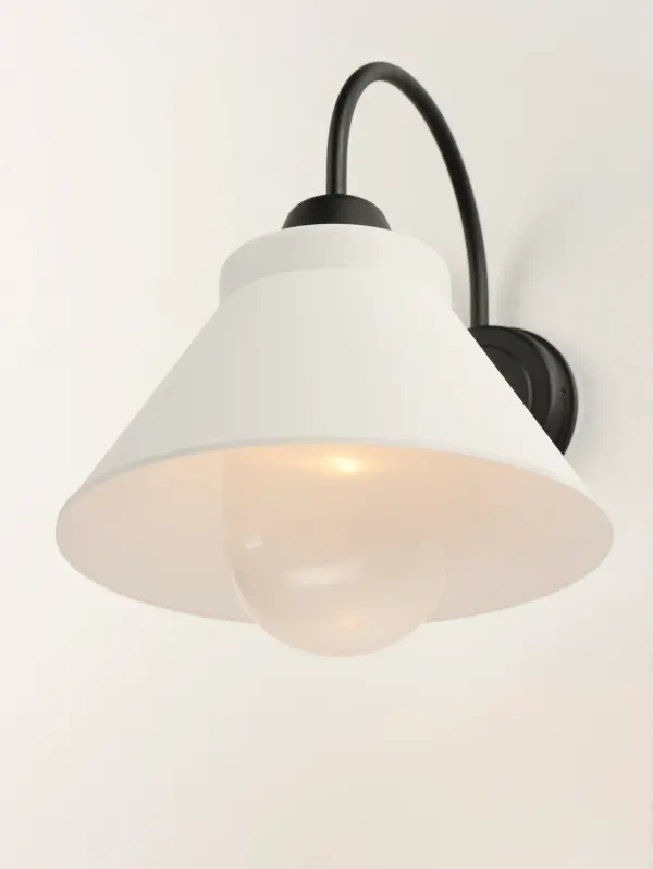 A powder coat aluminum frame support a durable polycarbonate shade in classic RLM styles. This an excellent choice for extreme environments like coastal areas. The combination Black frame and White shade create a dramatic look. - alternate view