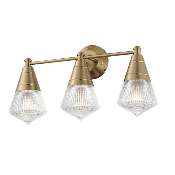A prismatic diffusion of light is housed within pressed cone glass shades. Choose from pendants with tapered metal halves that conceal the light source or glass shades that are supported by a metal ring. Coordinating bath vanity lights complete the collection. Collection: Hargreaves Finish: Natural Aged Brass Glass: Prairie Rib Frost Width: 24.00" Height: 12.00" Weight: 7.40 lb Extension from Wall: 7.00" Wire: 8" Canopy: 5"x5" Number of Bulbs: 3 Maximum Wattage: 60.00 W Bulb Type: A19 Bulb Base: E26 Medium Light Source: Incandescent Dimmable Voltage: 120.00 V Material: Steel, Glass Safety Listing: cULus Safety Rating: Damp Manufacturer Warranty: 3 Spec Sheet Instructions