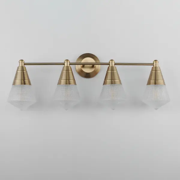 A prismatic diffusion of light is housed within pressed cone glass shades. Choose from pendants with tapered metal halves that conceal the light source or glass shades that are supported by a metal ring. Coordinating bath vanity lights complete the collection. Collection: Hargreaves Finish: Natural Aged Brass Glass: Prairie Rib Frost Width: 33.25" Height: 12.00" Weight: 9.60 lb Extension from Wall: 7.00" Wire: 8" Canopy: 5"x5" Number of Bulbs: 4 Maximum Wattage: 60.00 W Bulb Type: A19 Bulb Base: E26 Medium Light Source: Incandescent Dimmable Voltage: 120.00 V Material: Steel, Glass Safety Listing: cULus Safety Rating: Damp Manufacturer Warranty: 3 Spec Sheet Instructions - alternate view