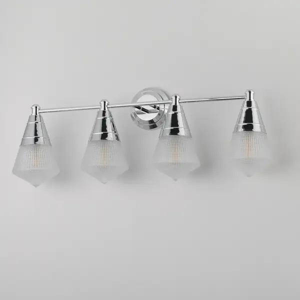 A prismatic diffusion of light is housed within pressed cone glass shades. Choose from pendants with tapered metal halves that conceal the light source or glass shades that are supported by a metal ring. Coordinating bath vanity lights complete the collection. Collection: Hargreaves Finish: Polished Chrome Glass: Prairie Rib Frost Width: 33.25" Height: 12.00" Weight: 9.60 lb Extension from Wall: 7.00" Wire: 8" Canopy: 5"x5" Number of Bulbs: 4 Maximum Wattage: 60.00 W Bulb Type: A19 Bulb Base: E26 Medium Light Source: Incandescent Dimmable Voltage: 120.00 V Material: Steel, Glass Safety Listing: cULus Safety Rating: Damp Manufacturer Warranty: 3 Spec Sheet Instructions - alternate view