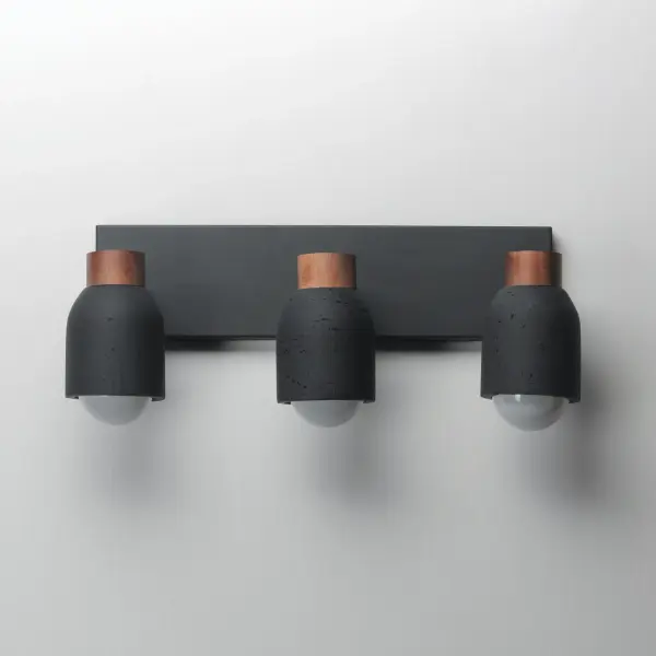 A tribute of natural materials, this collection features carved stone shades in your choice of Travertine or volcanic Lava Rock, paired with coordinating lathed wood bases. The Travertine composition showcases White Oak wood and Ecru white metal accents, while the blackened Lava Rock is beautifully complemented by Walnut wood and a Matte Black finish. Available in versatile pendant and wall sconce configurations, each piece highlights the organic beauty and timeless sophistication of its materials. - alternate view