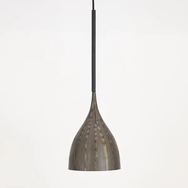 Graceful and sculptural, Fleur's gently flared silhouette brings a sense of quiet sophistication to any space. Hand-spun metal shades are adorned with a striated finish, scraped by hand to reveal glowing Gold undertones beneath layers of Matte Black or White. A matching Gold interior warms the light within, while a coordinating fabric cord suspends them for convenient height adjustments. Offered in multiple pendant sizes and a flush mount, Fleur offers tailored elegance to interior spaces such as entries and over a kitchen island. - alternate view