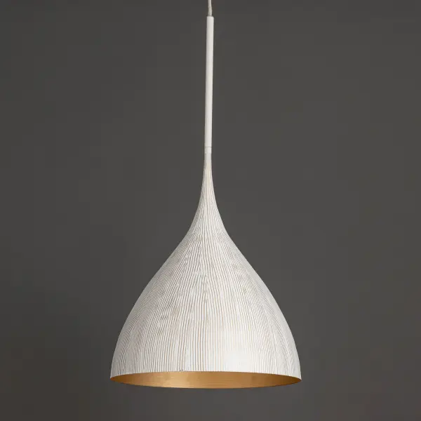 Graceful and sculptural, Fleur's gently flared silhouette brings a sense of quiet sophistication to any space. Hand-spun metal shades are adorned with a striated finish, scraped by hand to reveal glowing Gold undertones beneath layers of Matte Black or White. A matching Gold interior warms the light within, while a coordinating fabric cord suspends them for convenient height adjustments. Offered in multiple pendant sizes and a flush mount, Fleur offers tailored elegance to interior spaces such as entries and over a kitchen island. Collection: Fleur Finish: White/Gold Width: 16.50" Height: 21.00" Length: 16.25" Weight: 4.73 lb Wire: 120" Canopy: 5"x5"x0.5" Number of Bulbs: 1 Maximum Wattage: 100.00 W Bulb Type: E26 Bulb Base: E26 Medium Light Source: Incandescent Voltage: 120.00 V Material: Steel Safety Listing: cULus Safety Rating: Dry Spec Sheet - alternate view