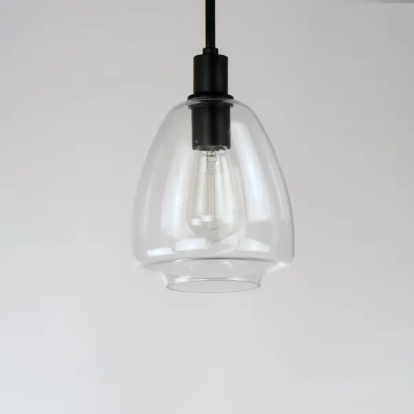 Pendants of Clear glass in unique elongated and undulating shapes with various sizes. This series pairs well with popular finishes in hardware and plumbing, giving you the flexibility to take chances with designer statement pieces. The metalwork is available in your choice of Matte Black, Satin Brass, or Satin Nickel. A coordinating wall sconce pairs well with the collection. Use filament bulbs to complete the look. - alternate view