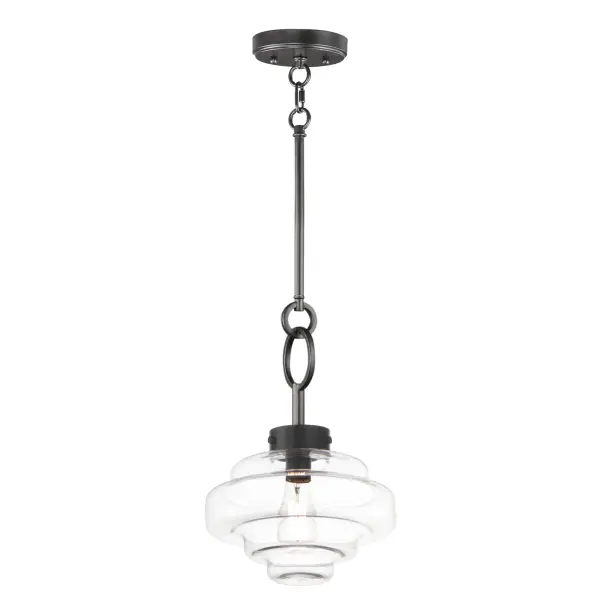 A sizable layered glass oscillates depth and is supported by three industrial set screws for support. Available as a pendant or flush mount, the pendant also features an oversized ring to evoking nautical vibes while remaining minimalist in its design. Available in Satin Nickel or Matte Black, pair the clear glass shades with a vintage filament lamps to complete the look.