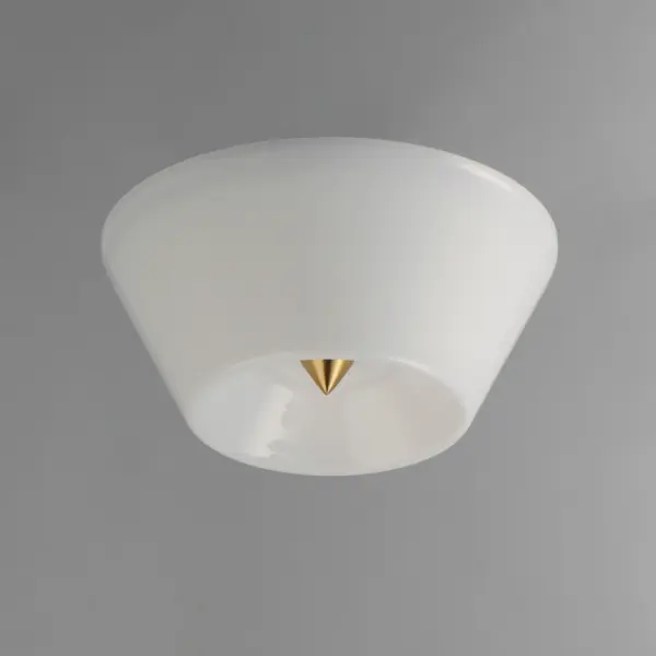 Accentuating the cone shape, this LED surface mounted fixture features a tapered glass shade and is supported by a conical finial in complementary finishes. Available in Polished Chrome, Matte Black, or Natural Aged Brass this simple design adds flair to a simple application. Collection: Tack Finish: Natural Aged Brass Glass: White Width: 10.00" Height: 4.25" Length: 10.00" Weight: 2.30 lb Wire: 8" Canopy: 9"x9"x3" Bulbs Included Number of Bulbs: 1 Maximum Wattage: 15.00 W Bulb Type: LED Bulb Base: Integrated Light Source: LED Light Output: 900.00 lm Color Temperature: 3000 K CRI: 90 Rated Average Life: 50000 Voltage: 120.00 V Material: Steel, Glass Safety Rating: Damp Title 24 LED Manufacturer Warranty: 3 Spec Sheet Instructions - alternate view