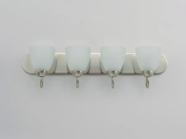 This transitional design works in any style home. Full length oval backplates support simple bell-shaped, Frosted glass shades. Available in Satin Nickel, Matte Black, and Polished Chrome. - alternate view