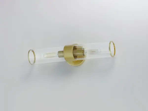 Simple, yet stylish, this minimal chandelier comes in your choice of Satin Brass or Matte Black bringing contemporary appeal. Clear Ribbed glass shades are fitted with rings in a coordinating color to complete the look. Collection: Crosby Finish: Satin Brass Glass: Clear Ribbed Width: 5.00" Height: 19.50" Weight: 2.31 lb Extension from Wall: 5.00" Wire: 8" Canopy: 0.75"x5" Number of Bulbs: 2 Maximum Wattage: 60.00 W Bulb Type: T Bulb Base: E26 Medium Light Source: Incandescent Dimmable Voltage: 120.00 V Material: Steel+Glass Safety Rating: Damp Manufacturer Warranty: 1 Spec Sheet Instructions Parts Diagram - alternate view