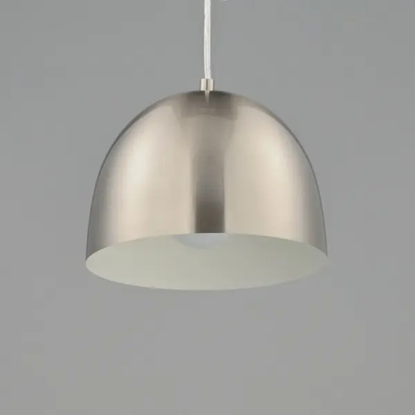 The essence of elevated everyday design, Tova brings timeless form into the modern home. With its clean half-dome silhouette and spun metal construction, this collection lends understated sophistication to kitchens, dining areas, and beyond. The Black finish with a gilded interior adds a warm, dramatic glow, while the Satin Nickel with white interior offers a crisp, versatile alternative. Whether installed solo or in multiples, Tova strikes the perfect balance of refinement and simplicity. Collection: Tova Finish: Satin Nickel Width: 9.00" Height: 7.00" Weight: 3.63 lb Wire: 120" Canopy: 5"x2.25" Number of Bulbs: 1 Maximum Wattage: 60.00 W Bulb Type: E26 Bulb Base: E26 Medium Light Source: Incandescent Voltage: 120.00 V Material: Steel Safety Listing: cULus Safety Rating: Dry Manufacturer Warranty: 5 Spec Sheet Instructions - alternate view