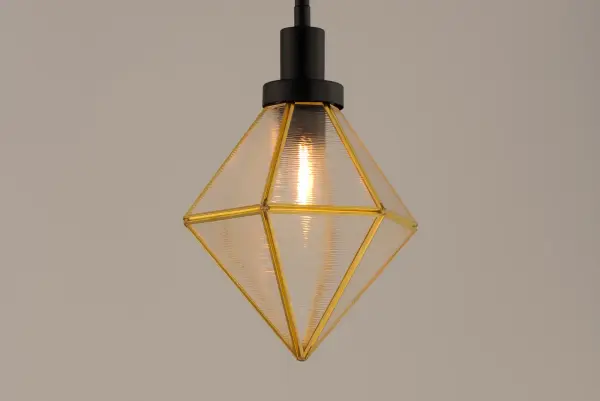 A diamond constructed of brass and aluminum, Adorn reimagines classic Bound Glass fixture by opting for a Black and Burnished Brass finish and distinct Ripple glass panels. The wall mounts are made of brass and aluminum which makes them suitable for outdoors as well as indoors. - alternate view