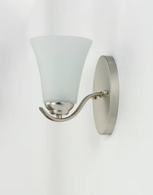 Gently waving arms of Satin Nickel or Oil Rubbed Bronze support tall-profile Frosted glass shades creating a scale normally not found in this category of lighting. The bath vanity may be installed up or down and also includes a Polished Chrome finish. Collection: Vital Finish: Satin Nickel Glass: Frosted Width: 5.50" Height: 8.50" Length: 7.50" Weight: 1.94 lb Extension from Wall: 7.50" Wire: 10" Canopy: 4.25"x7" Number of Bulbs: 1 Maximum Wattage: 60.00 W Bulb Type: A19 Bulb Base: E26 Medium Light Source: Incandescent Dimmable Voltage: 120.00 V Material: Steel, Glass Safety Listing: cULus Safety Rating: Damp Manufacturer Warranty: 1 Spec Sheet Instructions Parts Diagram - alternate view