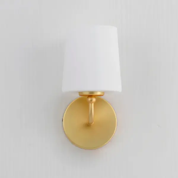 Understated elegance and convenience in its design, the simple curved arms of the Bristol collection outstretch in elongated proportions that terminate at a tapered Satin White glass shade. Designed to emulate a traditional fabric shade, the material being glass adds the element of easy maintenance and allows for upward and downward facing light installations. The single tiered wider diameters on the chandeliers also offer an upscale country living addition to the collection. Available in various finishes of Satin Nickel, Satin Brass, or black tones including a textured Anthracite finish on the chandeliers and sconces. Collection: Bristol Finish: Satin Brass Glass: Satin White Width: 5.00" Height: 10.00" Weight: 1.32 lb Extension from Wall: 6.50" Canopy: 4.75"x4.75" Number of Bulbs: 1 Maximum Wattage: 60.00 W Bulb Type: A19 Bulb Base: E26 Medium Light Source: Incandescent Voltage: 120.00 V Material: Steel, Glass Safety Rating: Damp Spec Sheet Instructions - alternate view