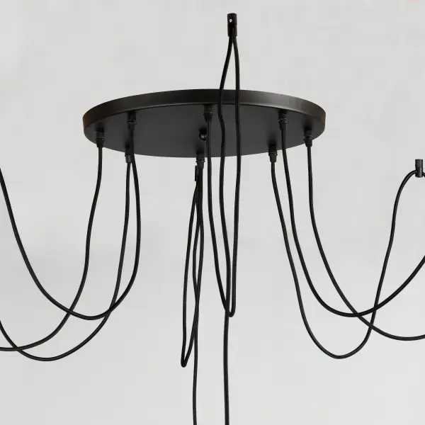 Cords of Black fabric support metal sockets finished in a natural Antique Brass allow you to create unique and fun lighting. All except the single pendant are supplied with hangers that attach to the ceiling to allow you to swag each socket. There are a number of optional bulbs to choose from. - alternate view