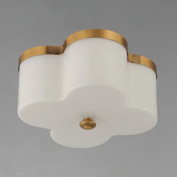 Honoring the traditional scalloped shade design in a range of materials, flush mounts are available in your choice of fabric, metal, or glass shades. The fabric shade features an Off-White linen fabric and is accented with Aged Brass metalwork. In the glass iteration, opal white glass features glossy elegant appeal with metal accents in Natural Aged Brass or Dark Bronze. The final iteration of metal shades has a white glass diffuser and metalwork finished in Polished Nickel or Natural Aged Brass. Collection: Clover Finish: Natural Aged Brass Glass: White Width: 13.50" Height: 6.75" Weight: 8.80 lb Wire: 8" Canopy: 13.5"x1" Number of Bulbs: 2 Maximum Wattage: 60.00 W Bulb Type: A19 Bulb Base: E26 Medium Light Source: Incandescent Dimmable Voltage: 120.00 V Material: Steel, Glass Safety Listing: cULus Safety Rating: Damp Manufacturer Warranty: 3 Spec Sheet Instructions - alternate view